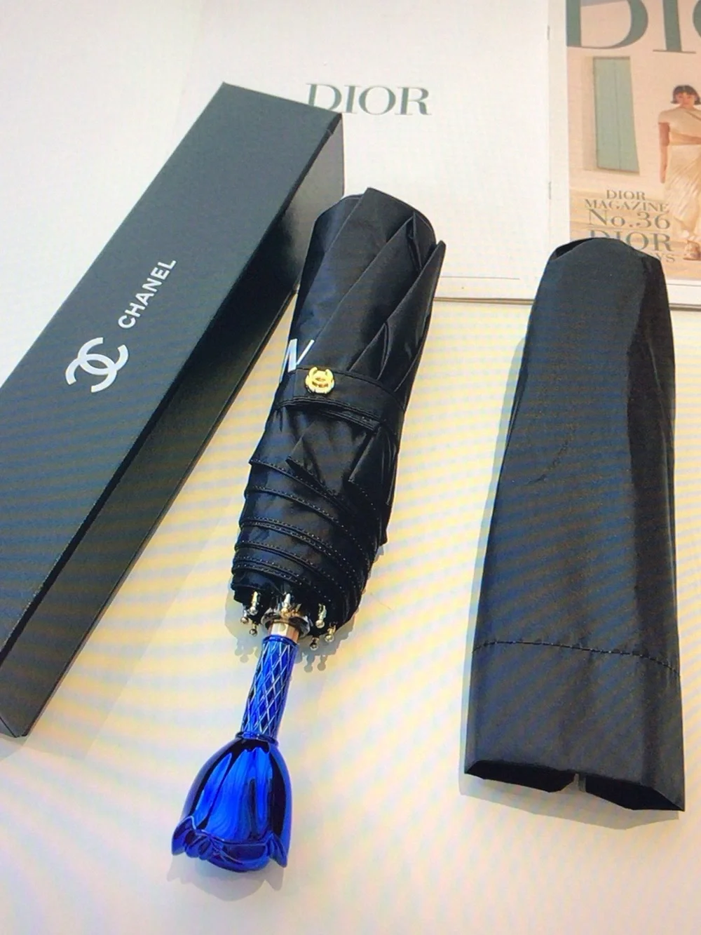 CHANEL Black Compact Umbrella with Blue Rose Handle